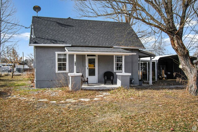 exterior space with a carport