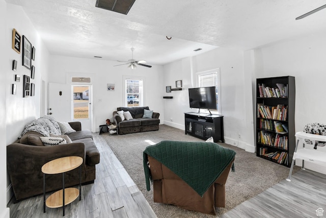 60 S 100 W, Monroe, UT 84754 - living room with a textured ceiling, hardwood / wood-style flooring, and ceiling fan