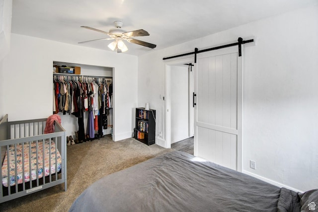 60 S 100 W, Monroe, UT 84754 - carpeted bedroom with ceiling fan, a barn door, and a closet