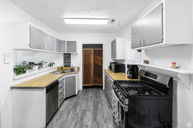 60 S 100 W, Monroe, UT 84754 - kitchen featuring stainless steel appliances, light wood-style flooring, light countertops, and gray cabinetry