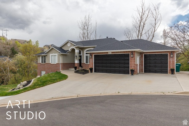 view of front facade with concrete driveway, brick siding, and a garage