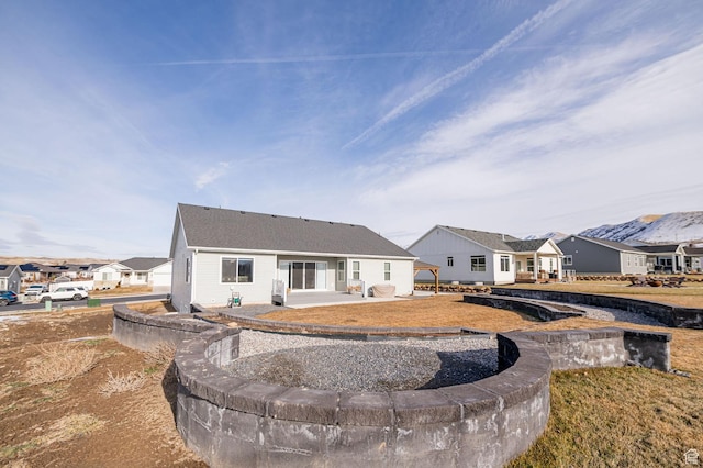638 E Canyon Rim Rd N, Smithfield, UT 84335 - rear view of property featuring a patio area
