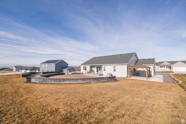 638 E Canyon Rim Rd N, Smithfield, UT 84335 - rear view of house featuring a gazebo, a patio area, and a yard