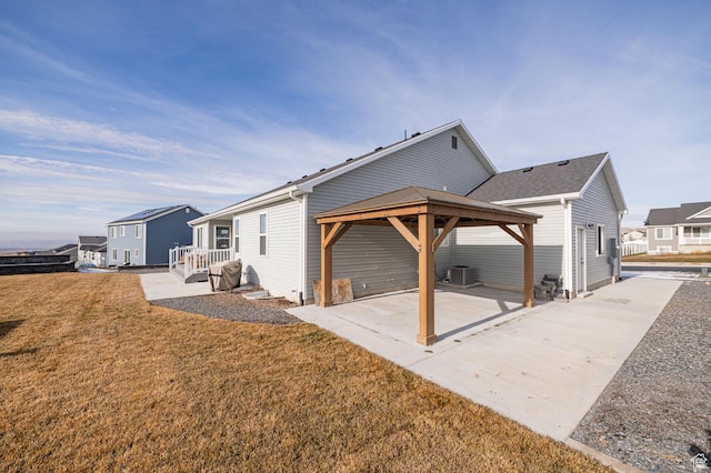 638 E Canyon Rim Rd N, Smithfield, UT 84335 - back of house featuring a gazebo, a yard, cooling unit, and a patio