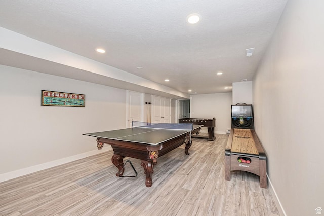 638 E Canyon Rim Rd N, Smithfield, UT 84335 - rec room with light hardwood / wood-style floors and a textured ceiling