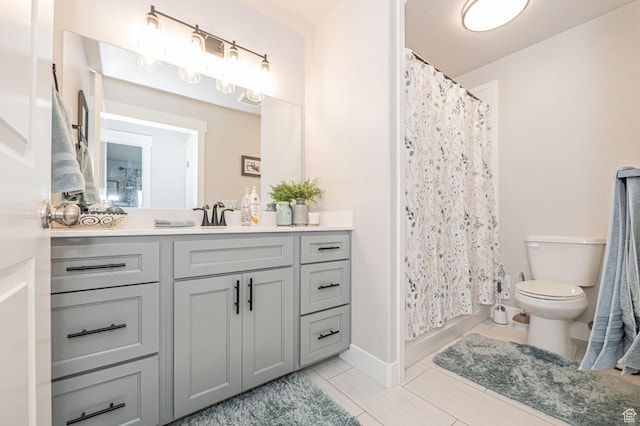 638 E Canyon Rim Rd N, Smithfield, UT 84335 - bathroom with toilet, vanity, tile patterned floors, and curtained shower