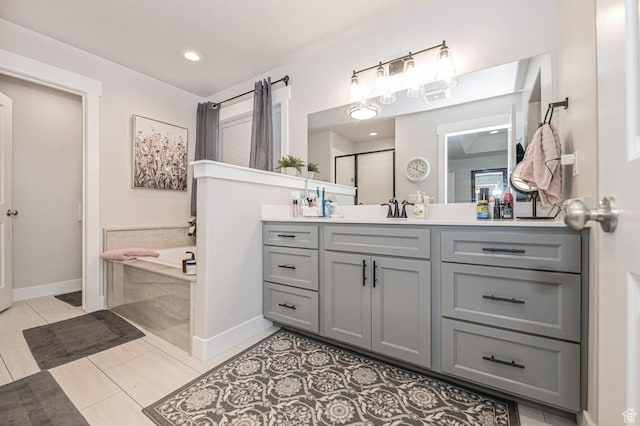 638 E Canyon Rim Rd N, Smithfield, UT 84335 - bathroom with tile patterned flooring, vanity, and independent shower and bath