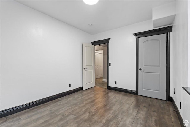 2493 S Aster Way, Saratoga Springs, UT 84045 - unfurnished bedroom with baseboards and wood finished floors