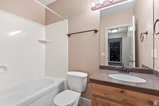 2493 S Aster Way, Saratoga Springs, UT 84045 - full bathroom featuring shower / bath combination, a textured wall, vanity, and toilet