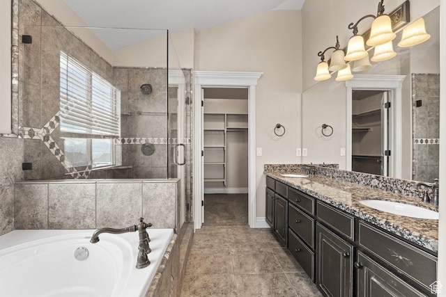 2493 S Aster Way, Saratoga Springs, UT 84045 - full bathroom with a walk in closet, vaulted ceiling, a sink, and a shower stall