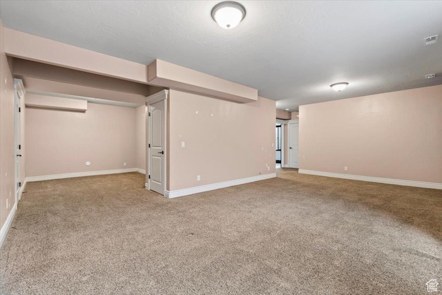 2493 S Aster Way, Saratoga Springs, UT 84045 - finished below grade area with carpet floors, baseboards, and a textured ceiling