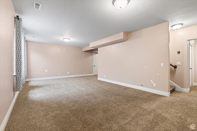 2493 S Aster Way, Saratoga Springs, UT 84045 - finished below grade area with stairway, baseboards, visible vents, and carpet flooring