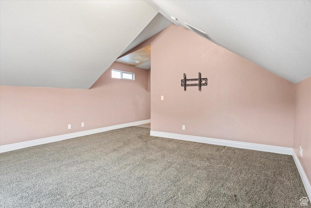 2493 S Aster Way, Saratoga Springs, UT 84045 - additional living space with lofted ceiling, carpet, and baseboards