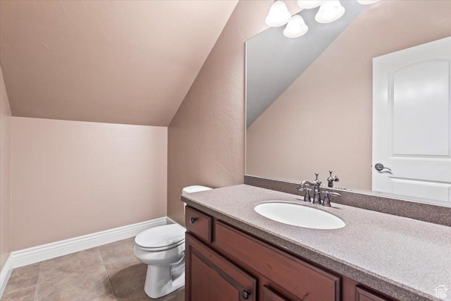 2493 S Aster Way, Saratoga Springs, UT 84045 - bathroom with baseboards, toilet, lofted ceiling, tile patterned floors, and vanity