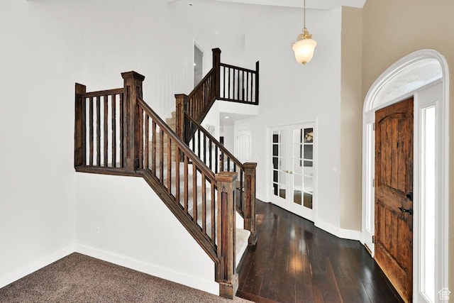 582 W 3900 N, Pleasant View, UT 84414 - foyer entrance featuring dark wood-type flooring, a high ceiling, and french doors