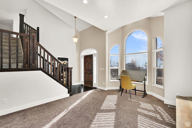 582 W 3900 N, Pleasant View, UT 84414 - foyer with dark carpet and high vaulted ceiling