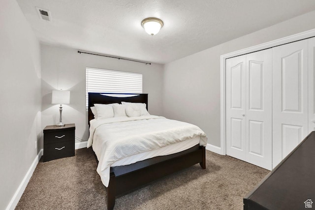 582 W 3900 N, Pleasant View, UT 84414 - carpeted bedroom with a closet and a textured ceiling