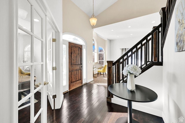 582 W 3900 N, Pleasant View, UT 84414 - entrance foyer with high vaulted ceiling, a wealth of natural light, and dark wood-type flooring