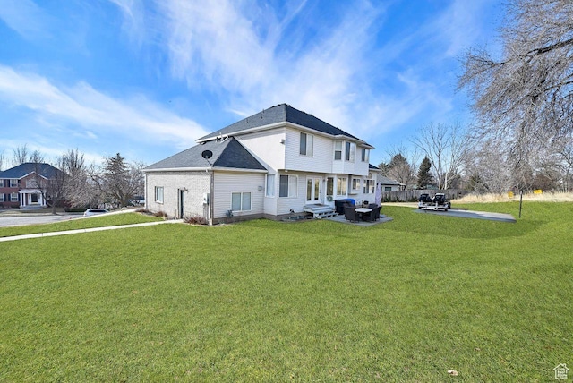 582 W 3900 N, Pleasant View, UT 84414 - rear view of property with a lawn and a patio area