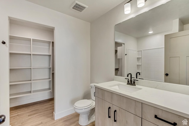 706 W Osborne Way S Unit 803, Grantsville, UT 84029 - bathroom with vanity, toilet, and wood-type flooring