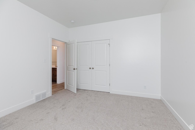 732 E 750 S, Preston, ID 83263 - unfurnished bedroom with a closet, carpet flooring, visible vents, and baseboards