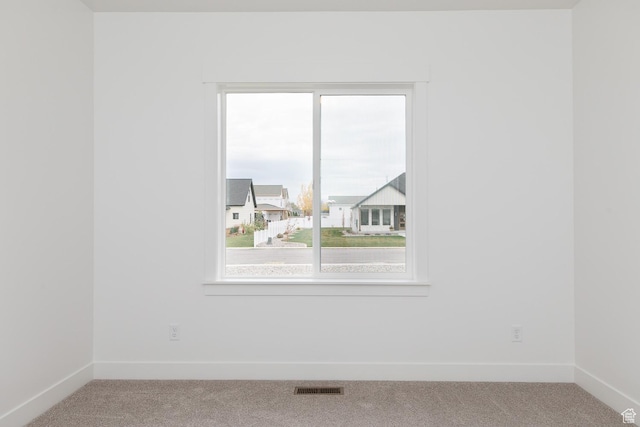 732 E 750 S, Preston, ID 83263 - unfurnished room featuring visible vents, baseboards, and carpet flooring