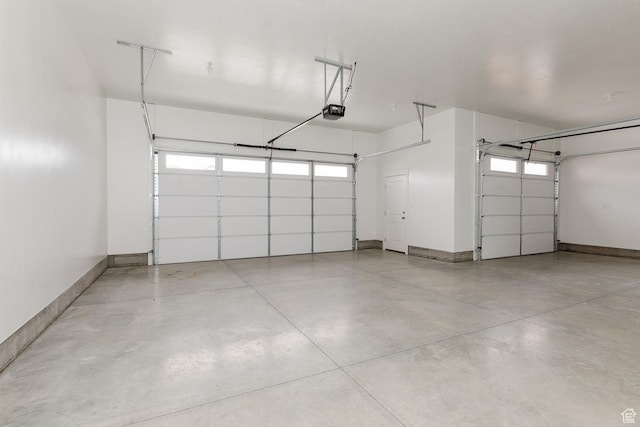 732 E 750 S, Preston, ID 83263 - garage featuring baseboards and a garage door opener