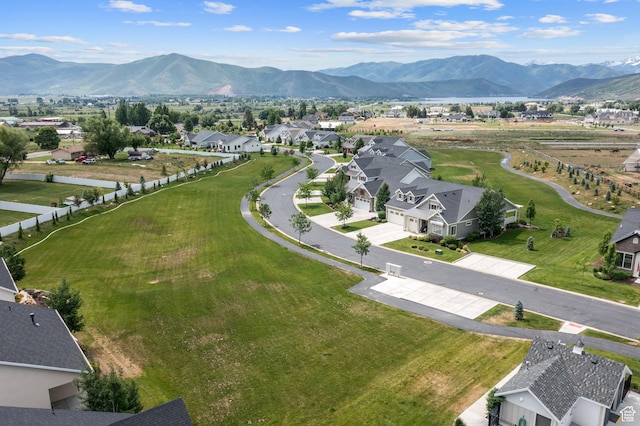 birds eye view of property with a residential view and a mountain view