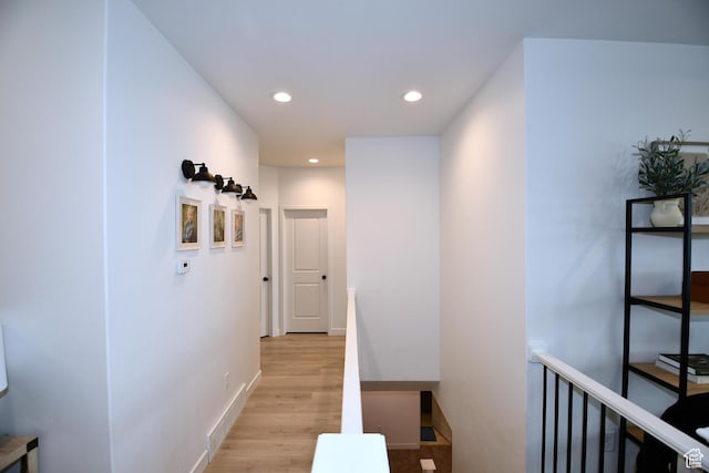 2129 N 3000 W, Plain City, UT 84404 - corridor with light wood-style flooring, an upstairs landing, recessed lighting, and baseboards