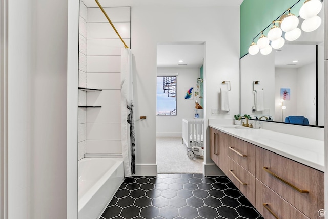 bathroom with vanity and shower / tub combo