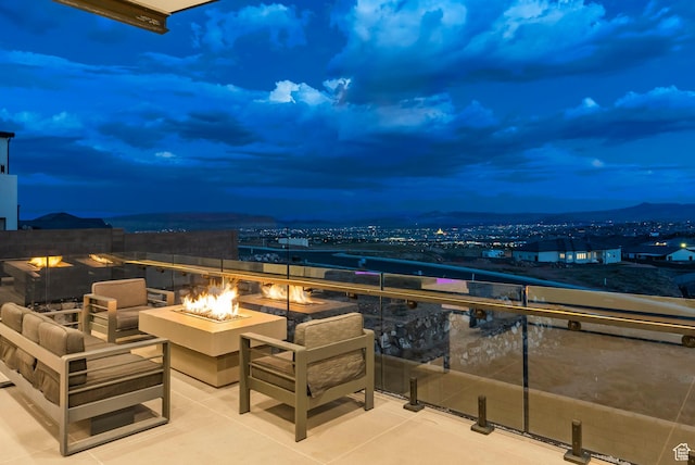 balcony with an outdoor fire pit