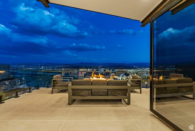 patio terrace at dusk with outdoor lounge area