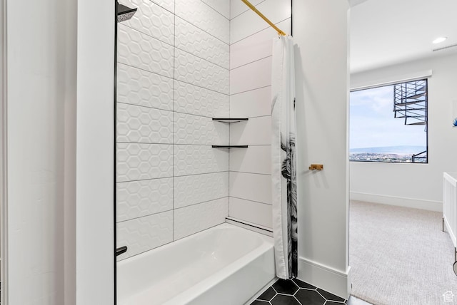 bathroom featuring tile patterned floors and shower / tub combo with curtain