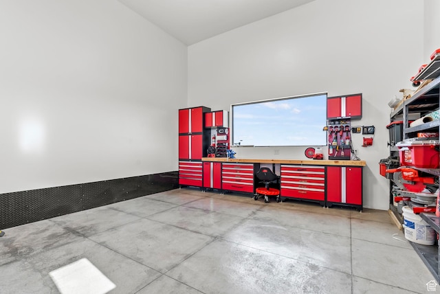 garage with a workshop area