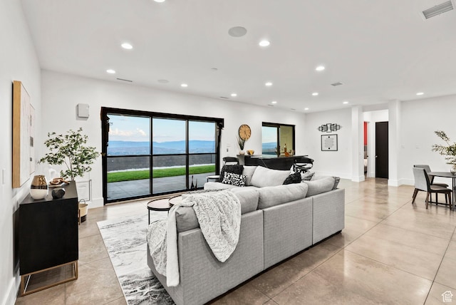 living room featuring a mountain view