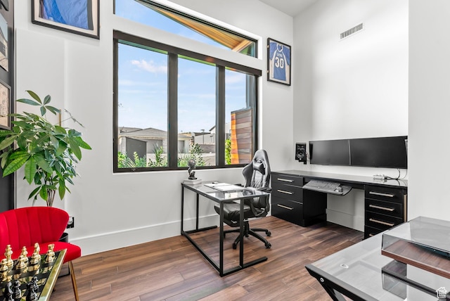 office space featuring dark wood-type flooring
