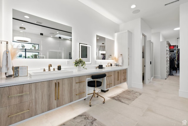 bathroom featuring vanity and tile patterned floors