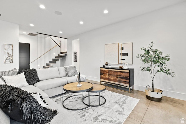 living room featuring concrete flooring