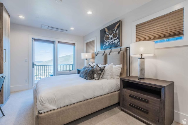 1269 Rothwell Rd, Park City, UT 84060 - bedroom featuring access to exterior, a mountain view, and light colored carpet