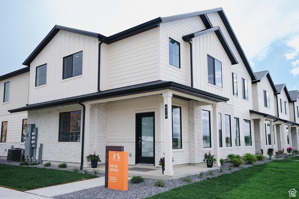 239 E 850 S Unit 136, Spanish Fork, UT 84660 - modern inspired farmhouse with a front yard and central AC unit