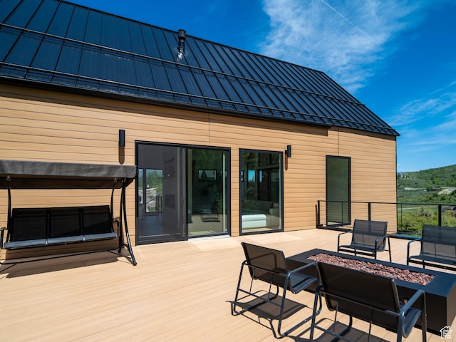 1113 S Quail Holw E, Huntsville, UT 84317 - wooden deck with a fire pit