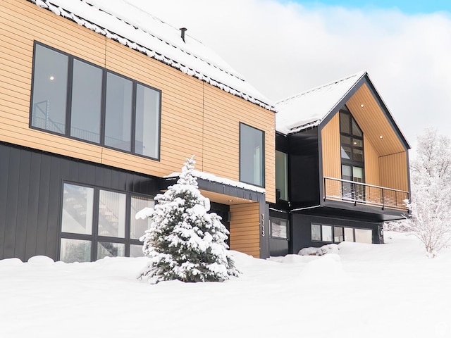 view of snow covered property