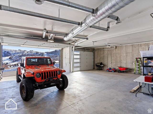 garage featuring a mountain view