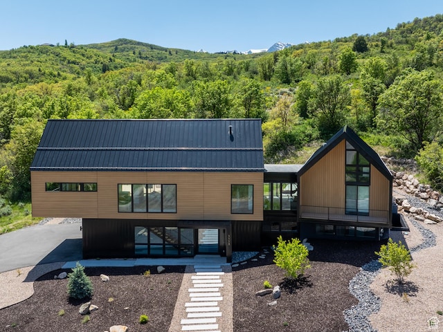 1113 S Quail Holw E, Huntsville, UT 84317 - view of front of home featuring a forest view, stairway, and a mountain view