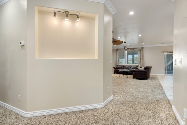hall featuring recessed lighting, carpet, crown molding, and baseboards