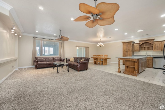 living room with light carpet, light tile patterned floors, crown molding, baseboards, and ceiling fan with notable chandelier