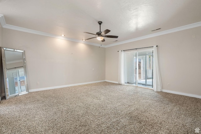 unfurnished room featuring ornamental molding, carpet floors, a ceiling fan, and visible vents