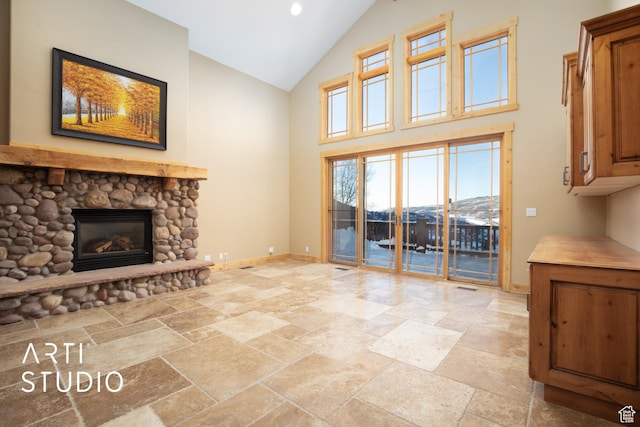 7352 Pine Dr, Park City, UT 84098 - living room featuring a fireplace and high vaulted ceiling