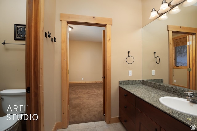 7352 Pine Dr, Park City, UT 84098 - bathroom with tile patterned flooring, vanity, and toilet