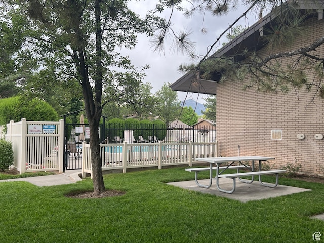 1581 E 6470 S, Murray, UT 84121 - view of yard featuring a community pool